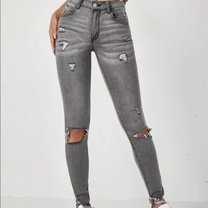 High Stretched Ripped Skinny Jeans